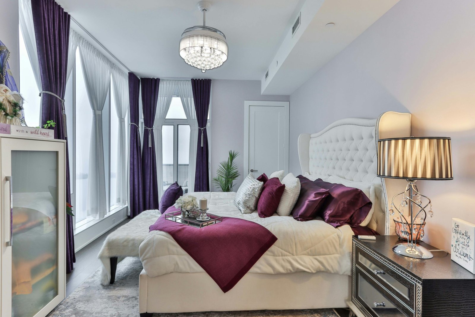 red throw pillows on white bed